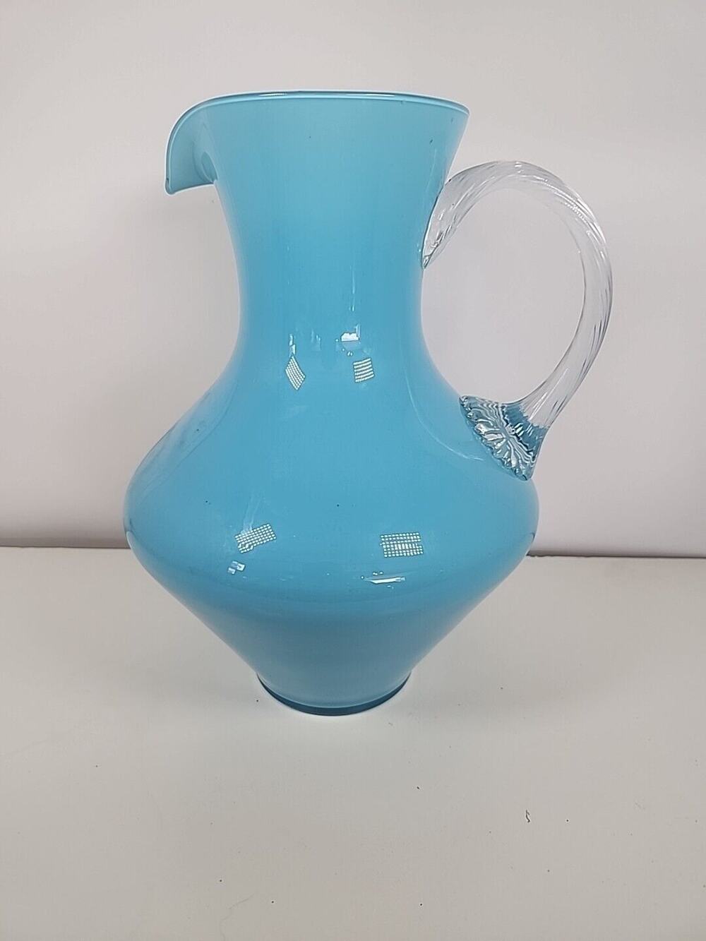 VINTAGE ART GLASS TORQUES BLUE HEAVY HAND MADE GLASS PITCHER W/CLEAR HANDLE